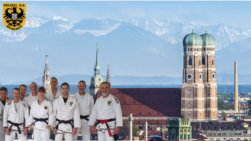 Gruppe von Ju-Jutsu-Kämpfern in Trainingskleidung.